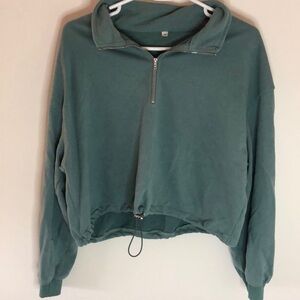 Quarter zip with waist tightener